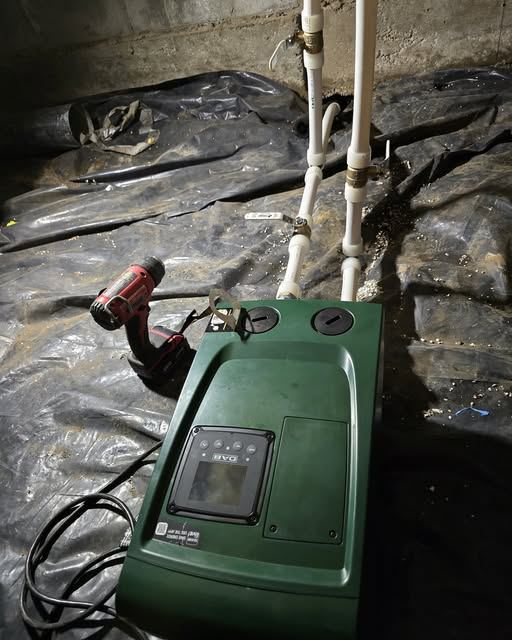 Pressure booster pump in a crawlspace