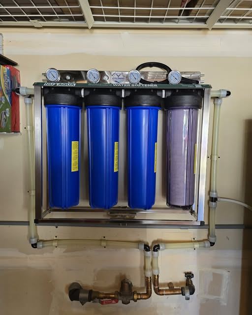 Whole-home water filtration system